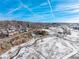 Aerial view of a residential area with houses and snow-covered landscape at 567 Lake Gulch Rd, Castle Rock, CO 80104