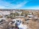 Aerial view of a house and surrounding area in winter at 567 Lake Gulch Rd, Castle Rock, CO 80104