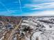 Aerial view of property with surrounding landscape and a road at 567 Lake Gulch Rd, Castle Rock, CO 80104