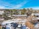 Aerial view of a house with cars parked in the yard at 567 Lake Gulch Rd, Castle Rock, CO 80104