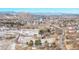 Aerial view showing property, roads, and distant mountain range at 567 Lake Gulch Rd, Castle Rock, CO 80104