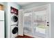 Convenient laundry closet with stackable washer and dryer at 1201 Galapago St # 109, Denver, CO 80204