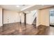 Finished basement with laminate wood flooring at 7251 Raritan St, Denver, CO 80221