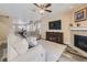 Living room with fireplace, hardwood floors and open concept at 2508 Coach House Loop, Castle Rock, CO 80109