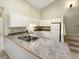 Simple kitchen featuring white cabinets and a double sink at 2818 W Centennial Dr # H, Littleton, CO 80123