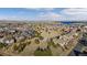 Aerial view of community with lake and homes at 24846 E Calhoun Pl # B, Aurora, CO 80016