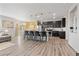 Open concept kitchen featuring a center island and dark cabinetry at 24846 E Calhoun Pl # B, Aurora, CO 80016