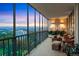 Spacious balcony with city views and seating area at 1201 N Williams St # 16C, Denver, CO 80218