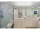 Bathroom with shower and double vanity at 1201 N Williams St # 16C, Denver, CO 80218