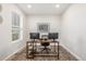 Bright home office featuring a desk and neutral decor at 21382 E 60Th Ave, Aurora, CO 80019