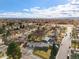 Aerial view of the house and surrounding neighborhood at 10698 W 26Th Ave, Lakewood, CO 80215