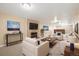 Finished basement with fireplace and sitting area at 10698 W 26Th Ave, Lakewood, CO 80215