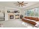 Living room with fireplace and comfortable seating at 385 N Flat Rock St, Aurora, CO 80018