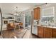 Bright kitchen with stainless steel appliances and access to backyard deck at 385 N Flat Rock St, Aurora, CO 80018