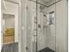 Modern shower with glass enclosure and subway tile at 385 N Flat Rock St, Aurora, CO 80018