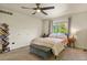Cozy bedroom with ceiling fan and bookshelf at 385 N Flat Rock St, Aurora, CO 80018