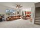 Open living room with ample natural light and comfortable seating at 385 N Flat Rock St, Aurora, CO 80018