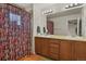Bathroom with double vanity and shower/tub combo at 385 N Flat Rock St, Aurora, CO 80018