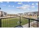 Community view with green space and modern buildings at 455 Interlocken Blvd # 101, Broomfield, CO 80021