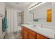 Clean bathroom, featuring a shower/tub combo and wood vanity at 10333 Georgia Cir, Morrison, CO 80465