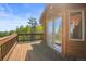 Spacious deck with mountain views and sliding glass doors at 10333 Georgia Cir, Morrison, CO 80465