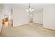 Bright dining room with hardwood floors and a chandelier at 10333 Georgia Cir, Morrison, CO 80465