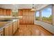 Bright kitchen with wood cabinets and mountain views at 10333 Georgia Cir, Morrison, CO 80465