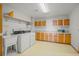 Laundry room with washer, dryer, and ample storage at 10333 Georgia Cir, Morrison, CO 80465