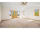 Spacious main bedroom with access to a deck and mountain views at 10333 Georgia Cir, Morrison, CO 80465