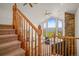 Staircase overlooking living room with mountain view at 10333 Georgia Cir, Morrison, CO 80465