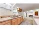 Basement kitchenette with cabinets and double sink at 20083 E Caspian Cir, Aurora, CO 80013