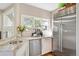 Updated kitchen featuring granite countertops and stainless steel appliances at 141 N Gilpin St, Denver, CO 80218