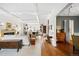 Elegant living room with hardwood floors and a view to the kitchen at 141 N Gilpin St, Denver, CO 80218