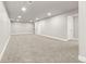 Finished basement offering a large open space with neutral carpet at 129 W 81St Pl, Denver, CO 80221