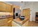 Kitchen features stainless steel appliances and wood cabinetry at 31037 Witteman Rd, Conifer, CO 80433