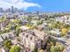 Stunning aerial view of the building with city skyline in the background at 1699 N Downing St # 302, Denver, CO 80218