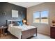 Cozy bedroom with a window offering scenic views at 4517 Tallyrand Cir, Castle Rock, CO 80104