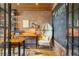 Charming home office with exposed brick and chalkboard wall at 4517 Tallyrand Cir, Castle Rock, CO 80104