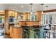 Modern kitchen with granite countertops and stainless steel appliances at 4517 Tallyrand Cir, Castle Rock, CO 80104