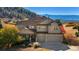 Two-story house with a large yard and mountain views at 4517 Tallyrand Cir, Castle Rock, CO 80104