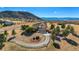 Luxury home with a long driveway and mountain backdrop at 4517 Tallyrand Cir, Castle Rock, CO 80104