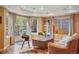 Finished basement with a comfortable sitting area and access to the backyard at 4517 Tallyrand Cir, Castle Rock, CO 80104