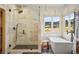 Spa-like bathroom with a soaking tub and large shower at 4517 Tallyrand Cir, Castle Rock, CO 80104
