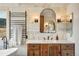Bathroom with a modern vanity and a large mirror at 4517 Tallyrand Cir, Castle Rock, CO 80104