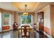 Formal dining room with large windows and hardwood floors at 4517 Tallyrand Cir, Castle Rock, CO 80104