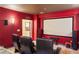 Home theater with screen, surround sound, and plush seating at 4517 Tallyrand Cir, Castle Rock, CO 80104