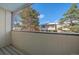 Private balcony with treetop views and surrounding buildings at 1827 Quail St # 3, Lakewood, CO 80215