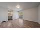 Spacious bedroom with wood-look flooring and access to a balcony at 1827 Quail St # 3, Lakewood, CO 80215