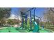 Modern playground with slides and shade structures at 1827 Quail St # 3, Lakewood, CO 80215