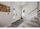 Bright entryway with modern flooring and a gray door at 105 N Bedford Ave, Castle Rock, CO 80104